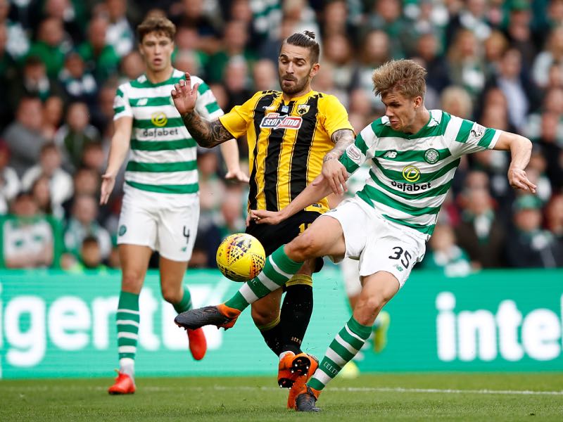 Marko Livaja of AEK Athens (L) and Kristoffer Ajer of Celtic compete for the ball during the UEFA Champions League Qualifier between Celtic and AEK Athens at Celtic Park Stadium on August 8, 2018 in Glasgow, Scotland. (Photo by Julian Finney/Getty Images)