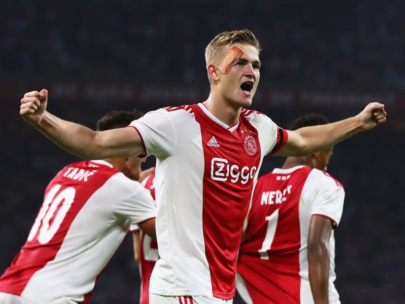 Matthijs de Ligt of Ajax celebrates scoring his teams second goal of the game during the UEFA Champions League third round qualifying match between Ajax and Royal Standard de Liege at Johan Cruyff Arena on August 14, 2018 in Amsterdam, Netherlands. (Photo by Dean Mouhtaropoulos/Getty Images)