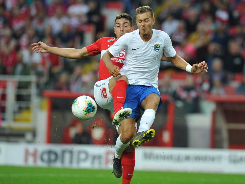 Ezequiel Ponce of FC Spartak Moscow and Timofey Margasov of PFC Sochi vie for the ball during the Russian Premier Liga match between FC Spartak Moscow and PFC Sochi on July 13, 2019 in Moscow, Russia. (Photo by Epsilon/Getty Images)